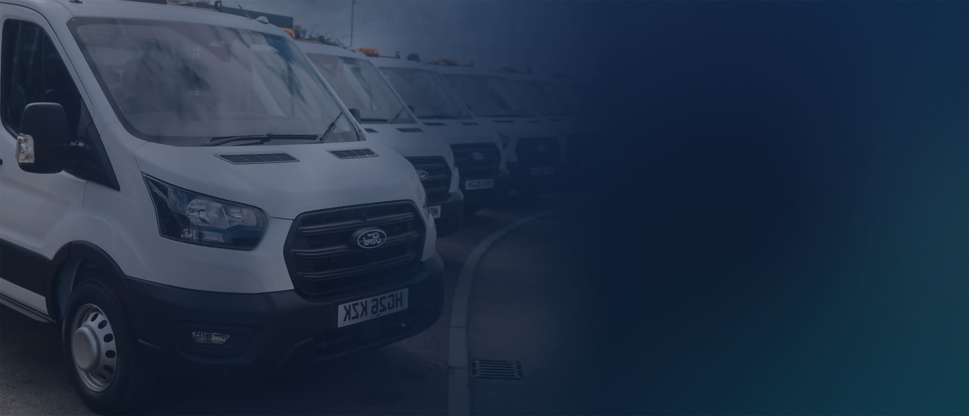 A fleet of Vangoo commercial vans